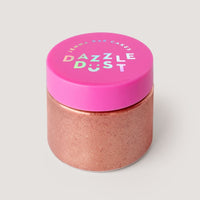 A clear jar with a bright pink lid labeled Jenna Rae Cakes holds Lucky Penny Edible Glitter—rose gold shimmer—in a 20g container, sold as a package of 3.