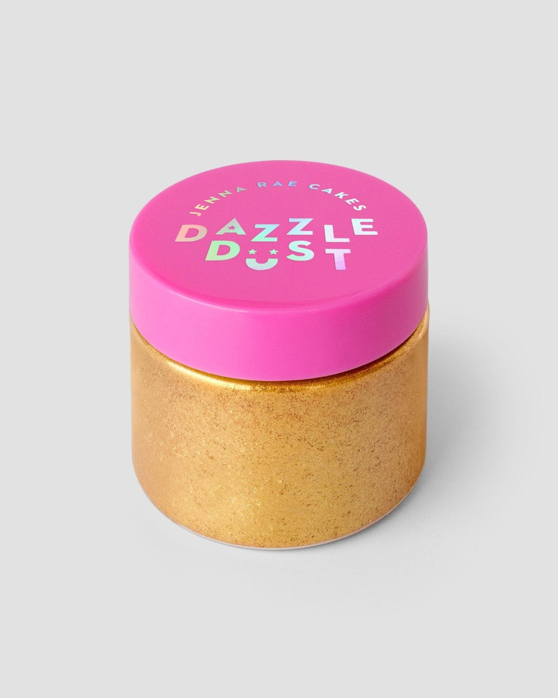 A gold jar with a bright pink lid labeled FND TESTING - 24k Magic Edible Glitter (Copy) by Jenna Rae Cakes contains edible glitter, shown against a plain gray background.