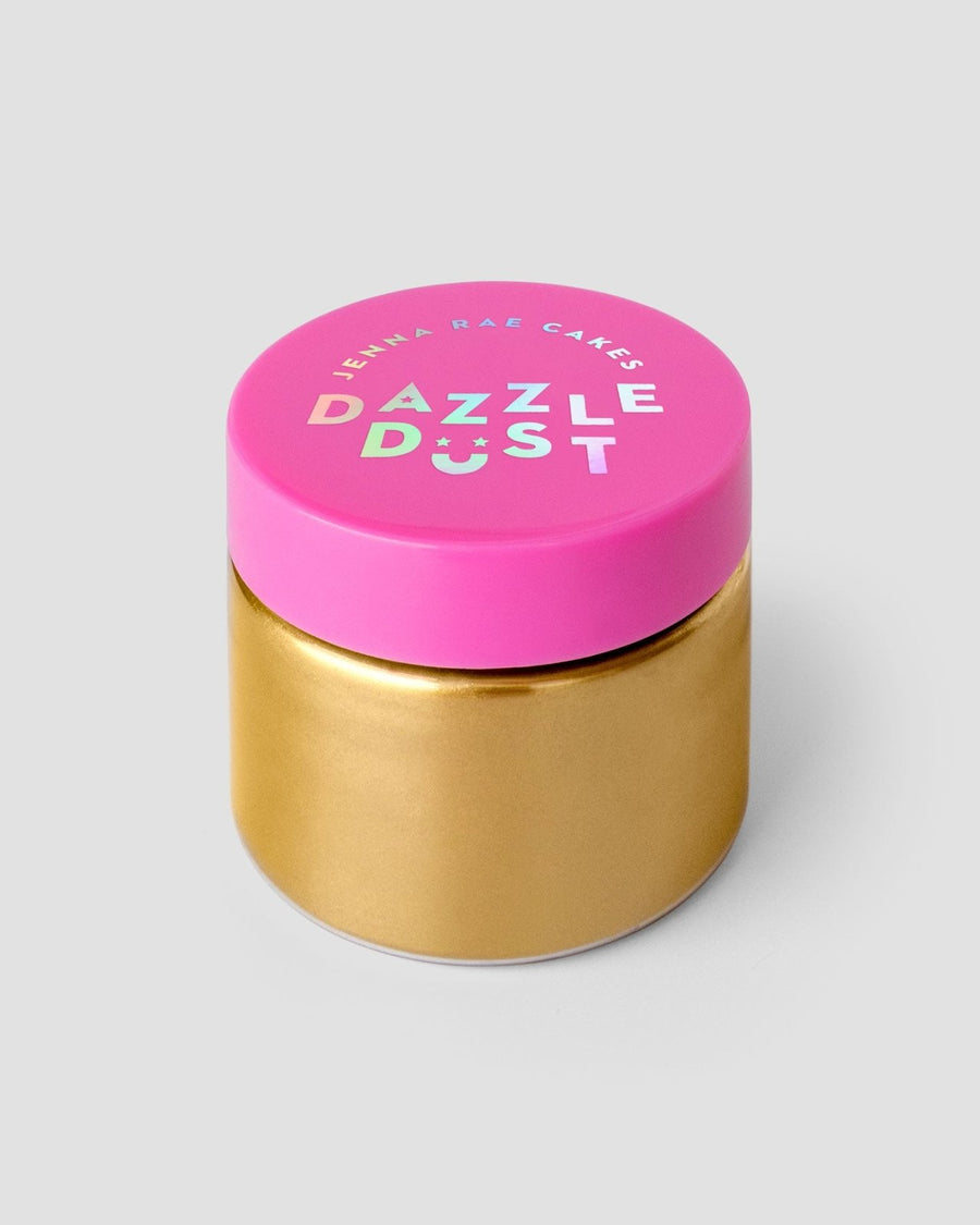 A set of three 20g containers of Jenna Rae Cakes Antique Gold Edible Lustre Dust is featured against a plain light gray background. Each jar has a bright pink lid with colorful Dazzle Dust lettering.