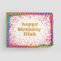 Jenna Rae Cakes Classic Sheet Cake features white icing, rainbow borders, colorful sprinkles, and happy birthday lilah written in yellow letters.