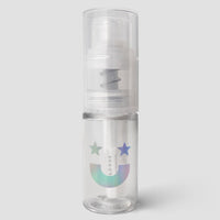 A set of 6 clear plastic Dazzle Dust Pump and Funnel bottles by Jenna Rae Cakes, each with a pump top and holographic smiley face with two stars, shown on a plain light gray background.