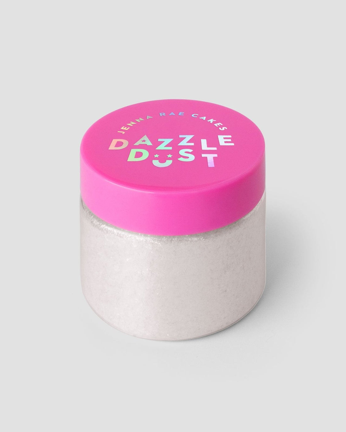 A clear jar with a bright pink lid shows Jenna Rae Cakes Diamond Edible Glitter in bold, colorful letters on a plain gray background, and is filled with white powder.