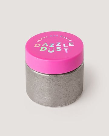 A small round jar with a metallic silver base and a bright pink lid labeled “Jenna Rae Cakes Disco Ball Edible Glitter - 20g Container - Package of 3,” set against a plain light background.
