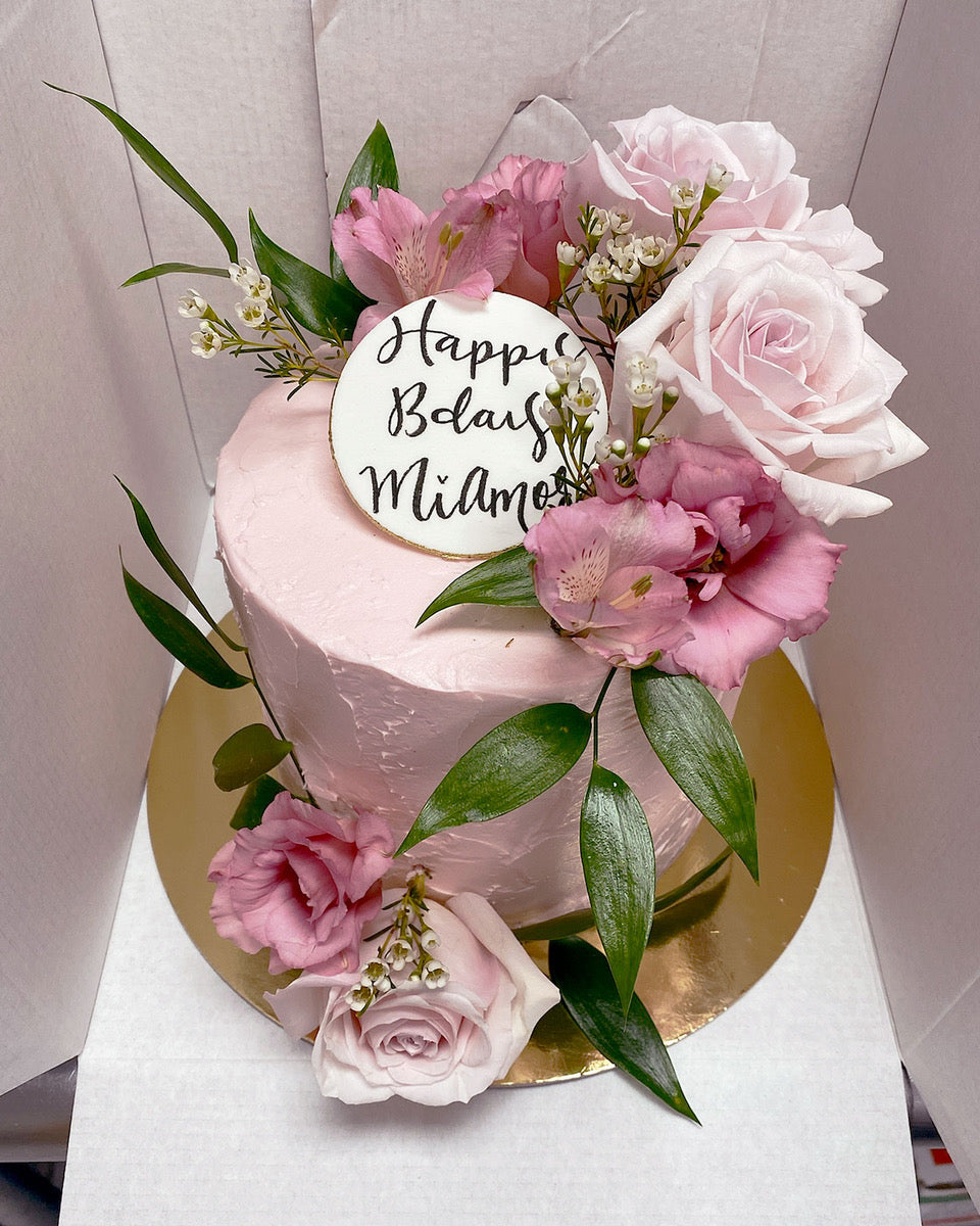 Design This Cake - Size: 6" | Exterior Colour: Soft Pink| Buttercream Finish: Rough | Flower Colour Palette: Blush and Pinks | Add Greeting Plaque