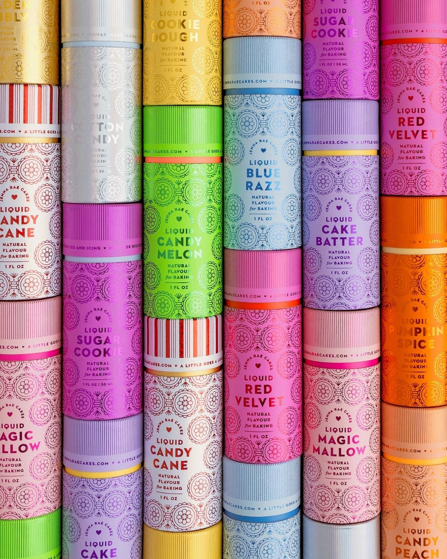 Vibrant cylindrical containers labeled Liquid Cotton Candy by Jenna Rae Cakes, sold in packages of 6, are stacked neatly to create a visually appealing display.