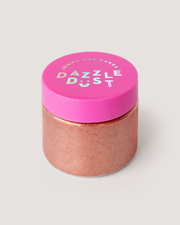A clear jar with a bright pink lid labeled Jenna Rae Cakes holds Lucky Penny Edible Glitter—rose gold shimmer—in a 20g container, sold as a package of 3.
